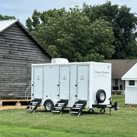 Royal Thrones three station restroom trailer